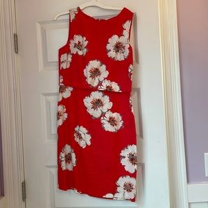 Beautiful coral dress with floral detail!